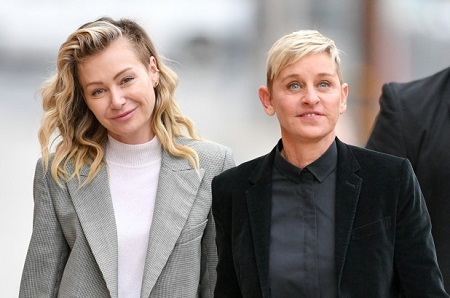Portia de Rossi and Ellen DeGeneres walking together